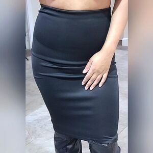 Black body-hugging pencil skirt